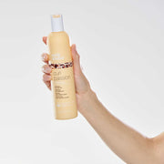 milk-shake-curl-passion-shampoo-in-hand